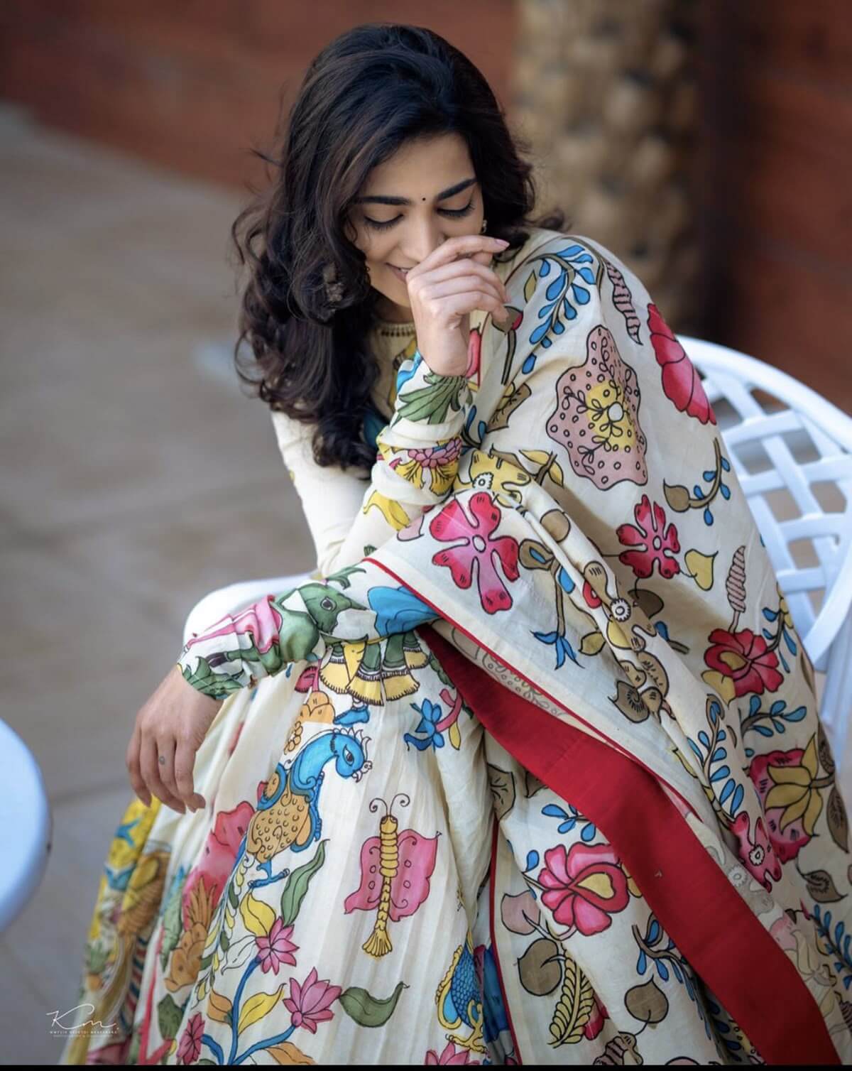 Handcrafted white oversize kurta set featuring vibrant hand-painted floral and bird motifs with a red border